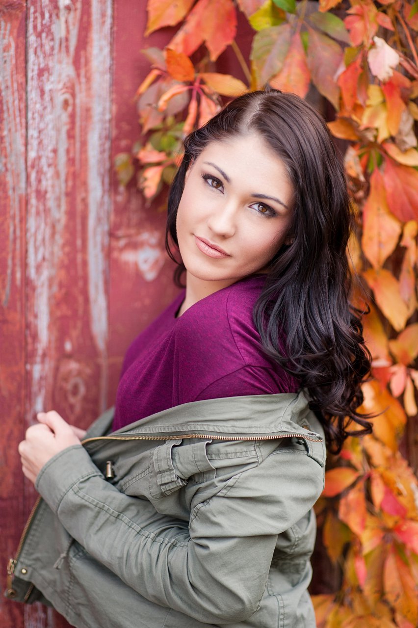 Posing senior girl portrait session with pops of fall color