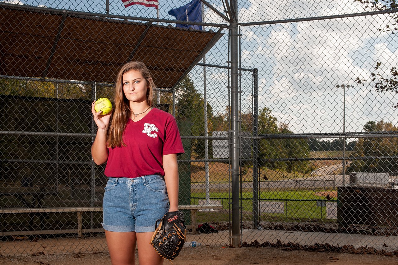 Senior girl softball portraits on softball field