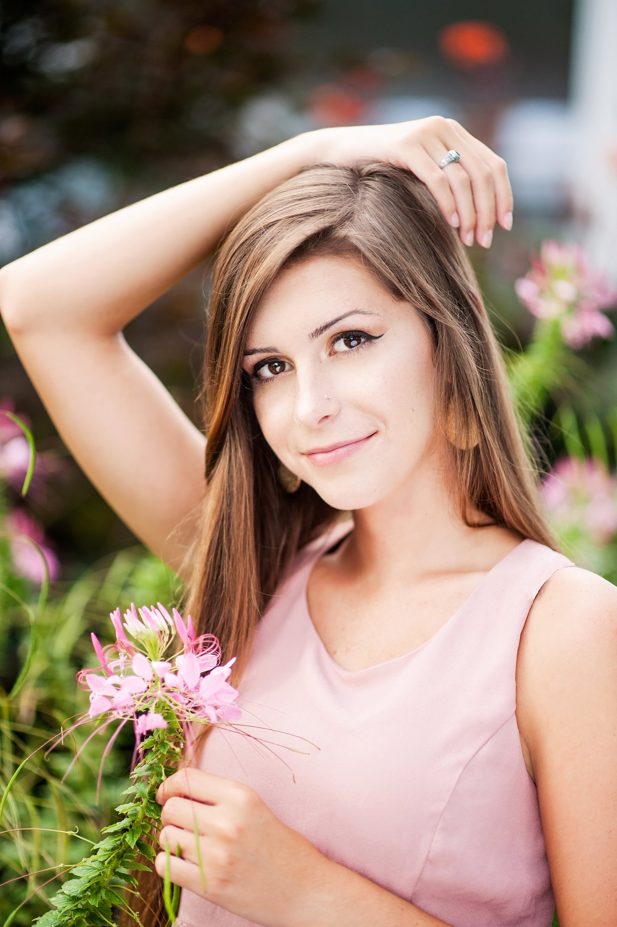 senior girl portrait session with pink dress and pink flowers, richmond virginia senior pictures at amber grove