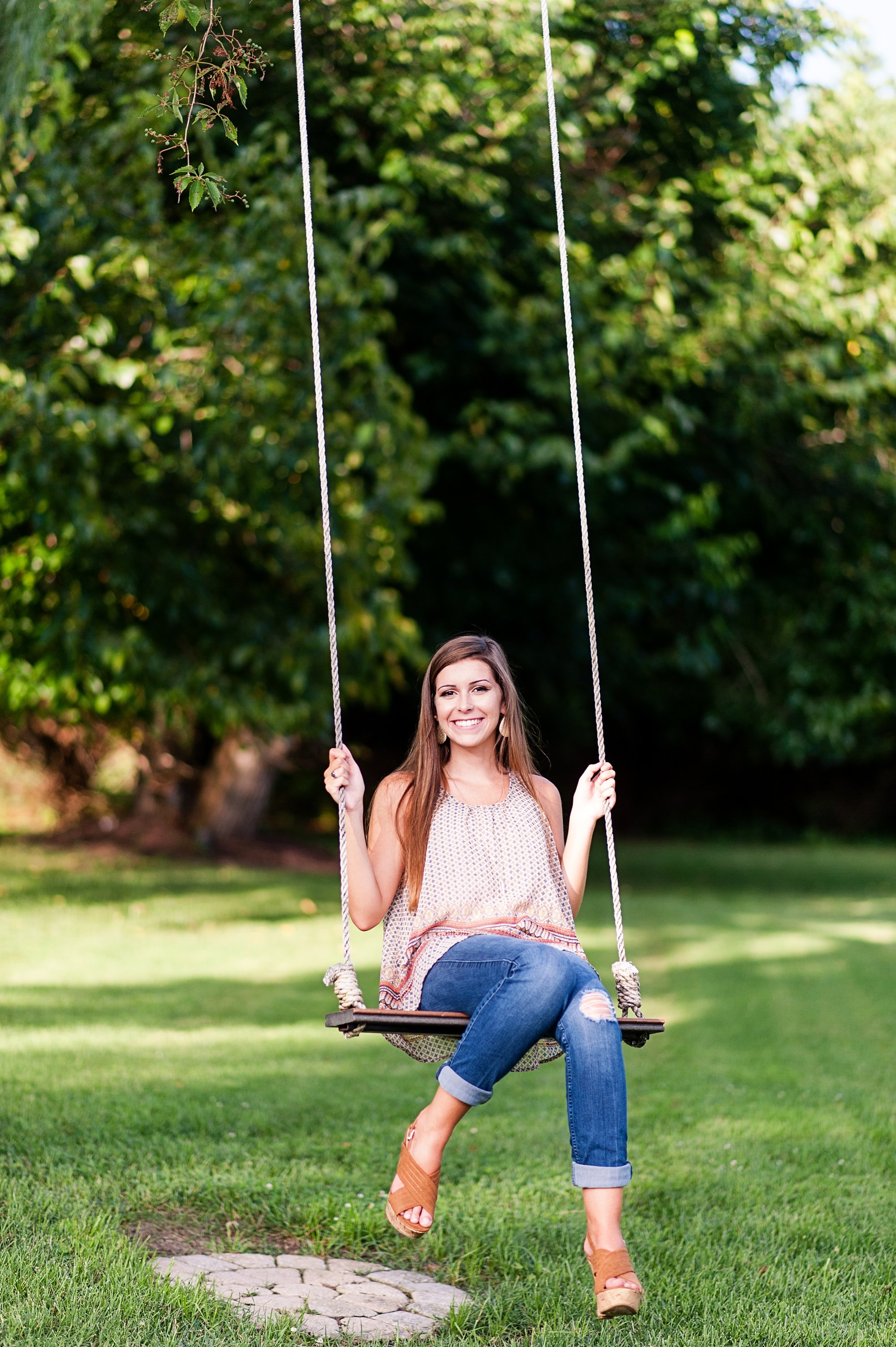 richmond virginia senior pictures at amber grove with senior girl in swing