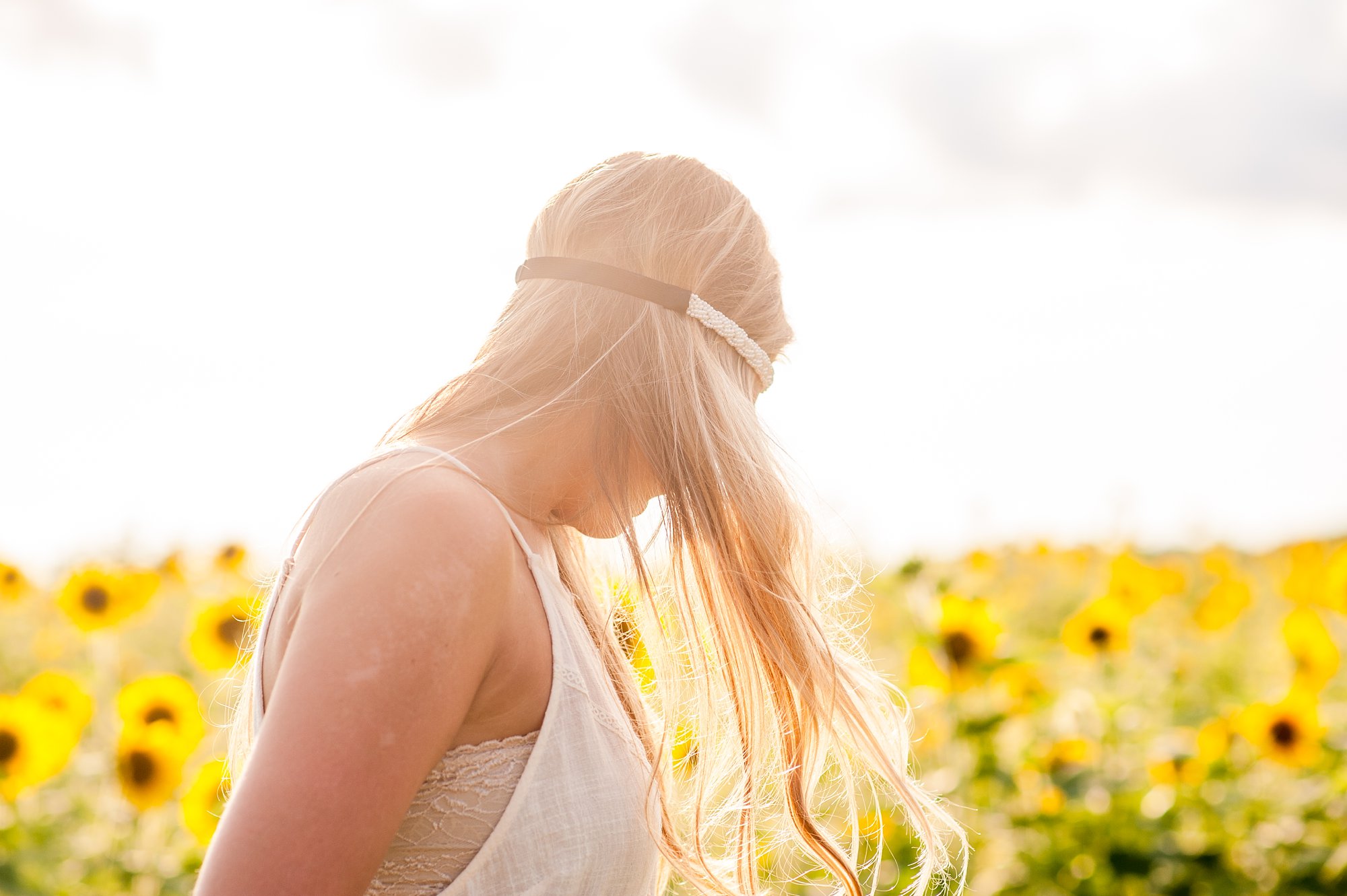 goochland high school senior girl in sunflower field