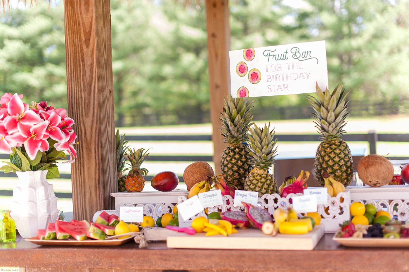 Fruit bar and sign for vintage cabana inspired birthday party